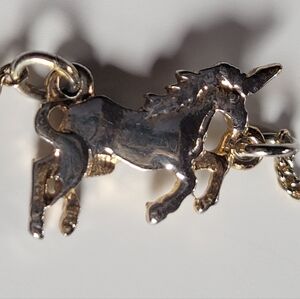 dainty unicorn charm on fine 16-in chain